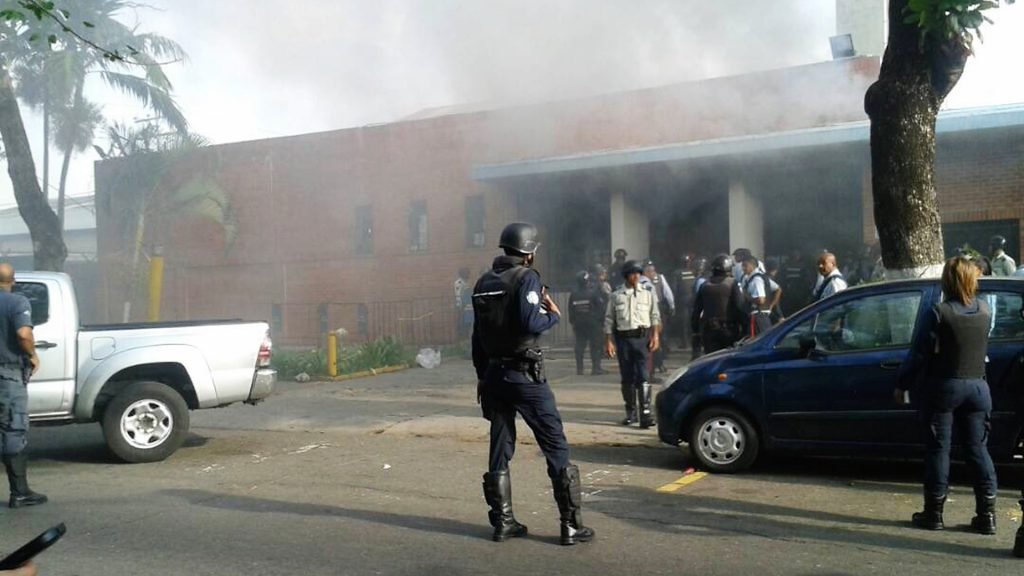 Condena ONU 68 muertes por incendio y motín en separo de Venezuela